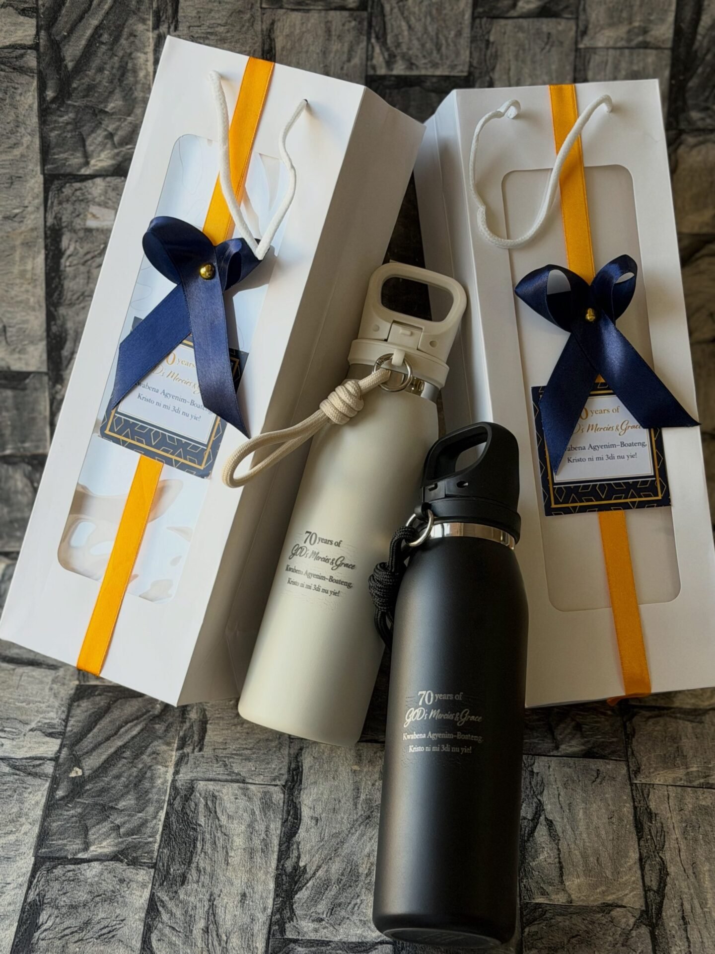 Customized and packaged vacuum sealed bottle with rope strap