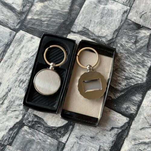 Crown shaped metal opener and keyholder