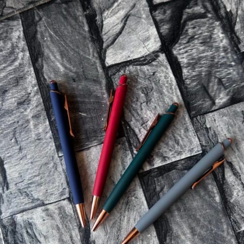 Rose gold tip pressing pen.