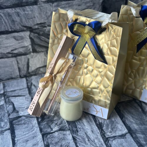 customized and packaged wooden fan and shea butter and cased pen