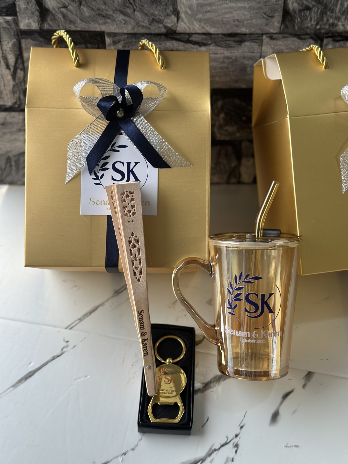 customized and packaged Long Glass cup and straw with wooden fan and golden keyholder